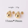 Golden teardrop-shaped earrings with a minimalist